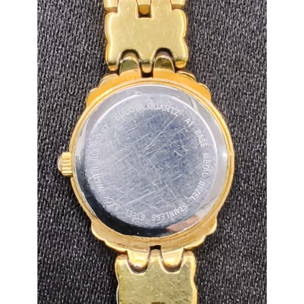 Caravelle by Bulova 44P07 women's Watch Gold Tone Round White Face #W5153